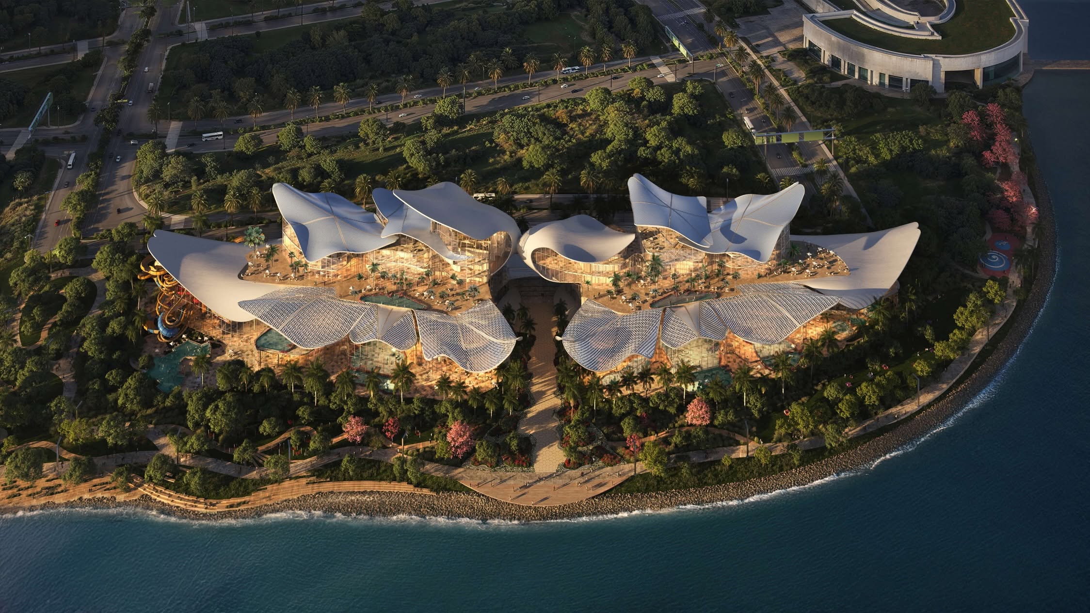 therme singapore marina south aerial birdseye wellness attraction waterfront Bird's eye aerial view of the Therme Singapore wellness attraction masterplan at Marina South waterfront, showing the full 4-hectare site layout adjacent to Marina Barrage